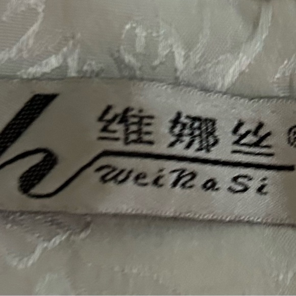 WhiteNylon feel Chinese dress with design on front. - Picture 8 of 11